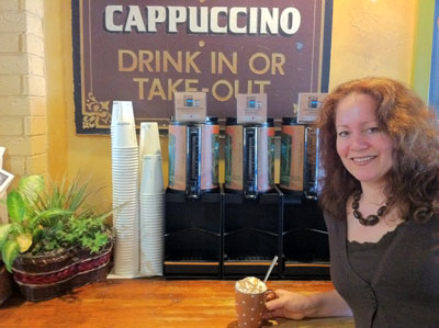 CJ standing beside Coffe Pots
